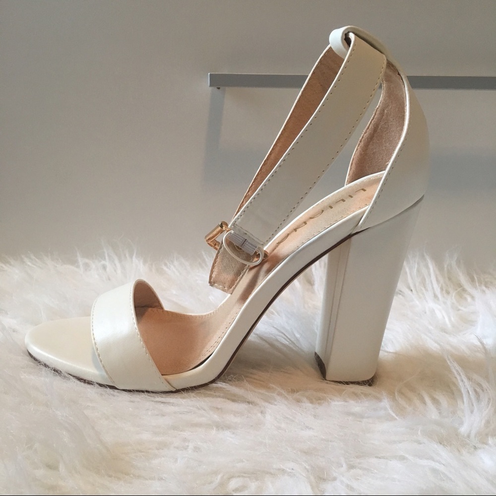 Lulu's white heels