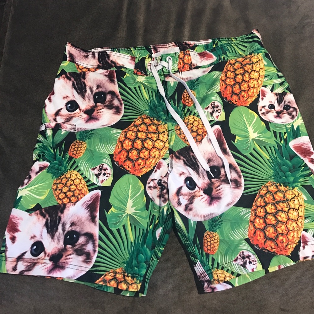 Space kitty pineapple board shorts