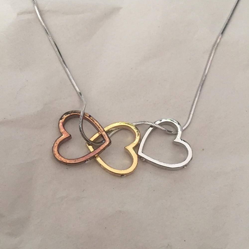 Gold, bronze, and silver heart necklace