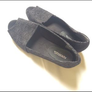 Black open toed short heel shoes