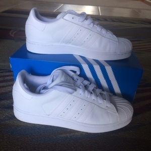 White Adidas Superstars