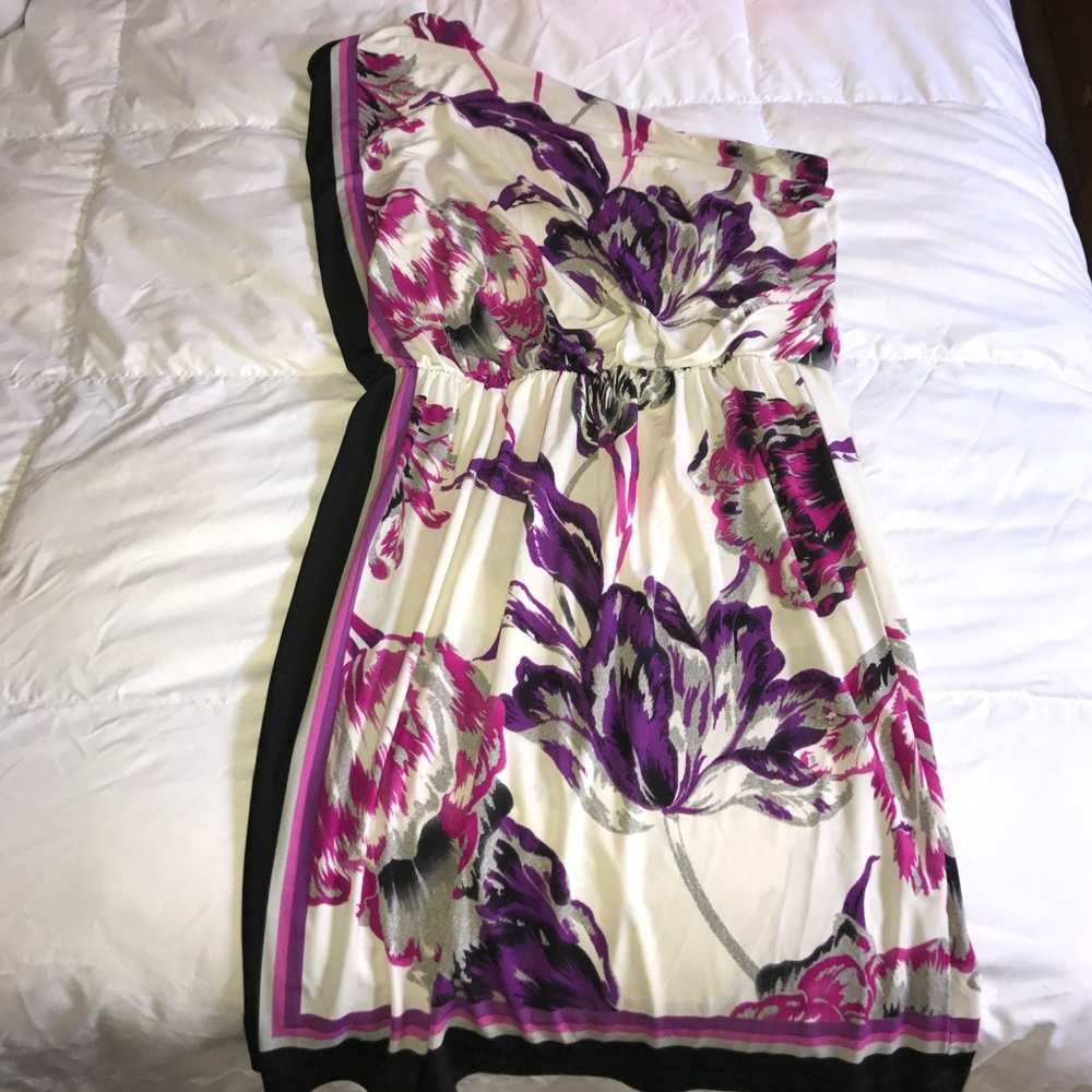 One shoulder, mid thigh length dress.