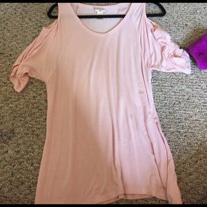 Soft pink top with cut shoulders
