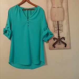 Turquoise blouse with 3/4 sleeves