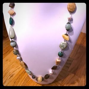 Long beautiful necklace of sem-precious stones
