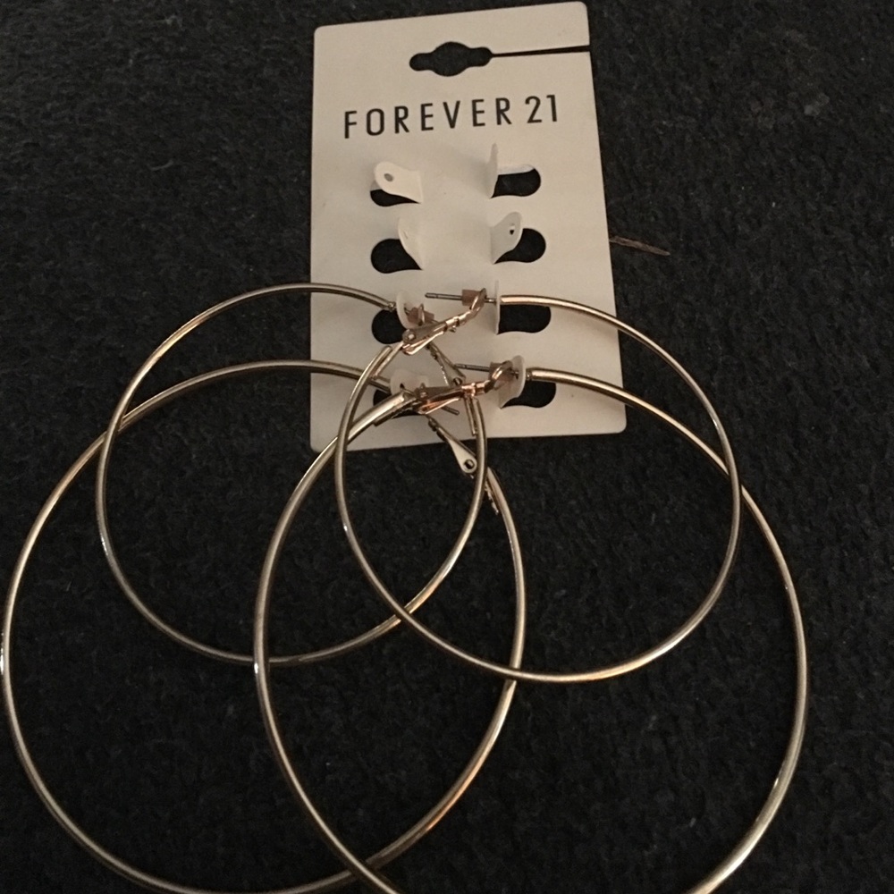 Large gold hoops from forever 21. Two pairs.