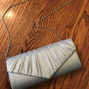 Silver glitter clutch with shoulder strap
