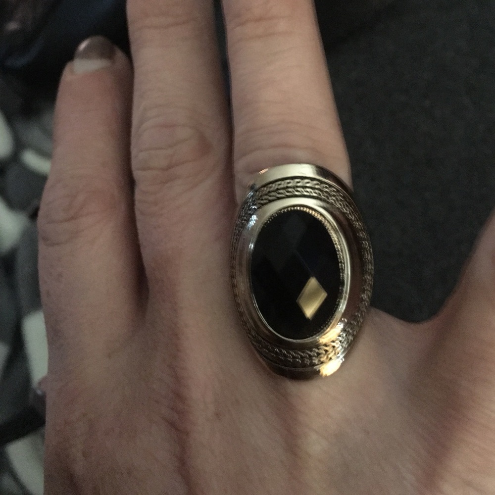 Onyx or Citrine stone and gold tone ring.