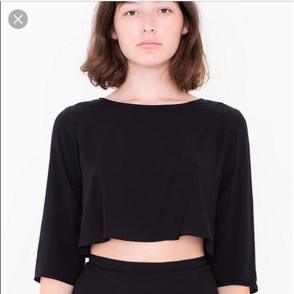 Black crop top, button back detail.
