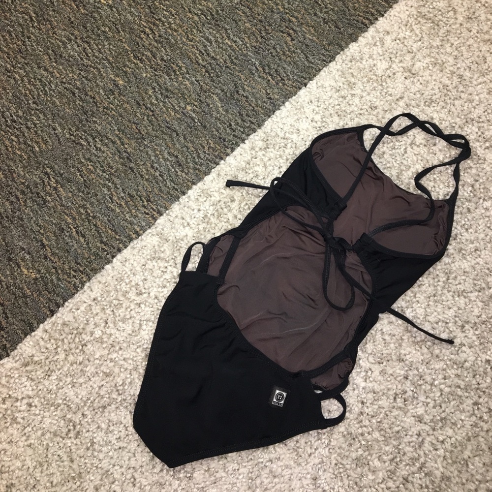 Used Jolyn tie-back onesie