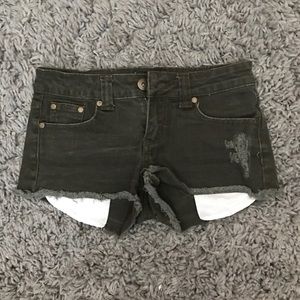 Dark army green shorts. Long pockets.