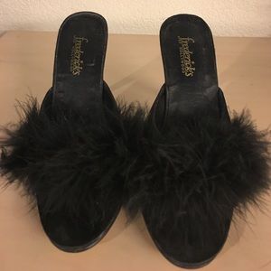 Fredericks of Hollywood slippers .