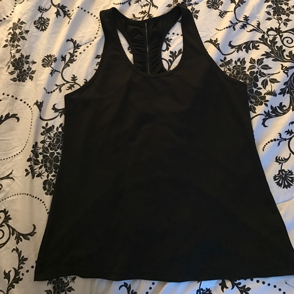 Nice top with cute details on back.