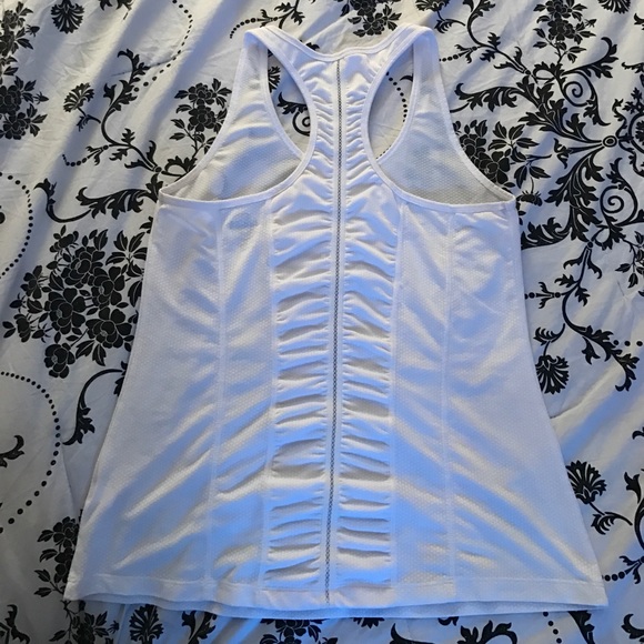 Nice top with cute details on back. - Picture 2 of 3