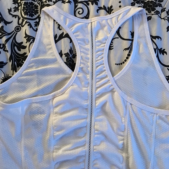 Nice top with cute details on back. - Picture 3 of 3