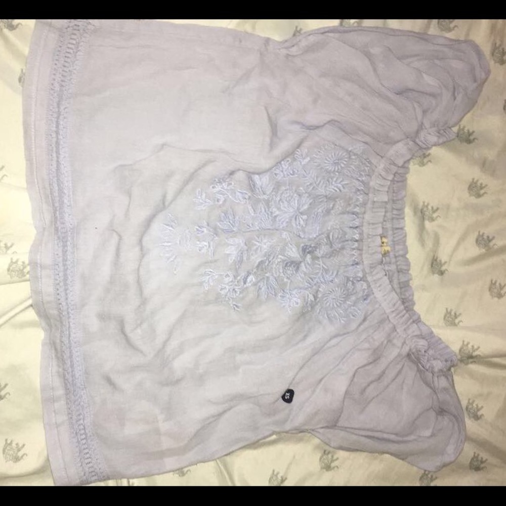 Blue off the shoulder shirt