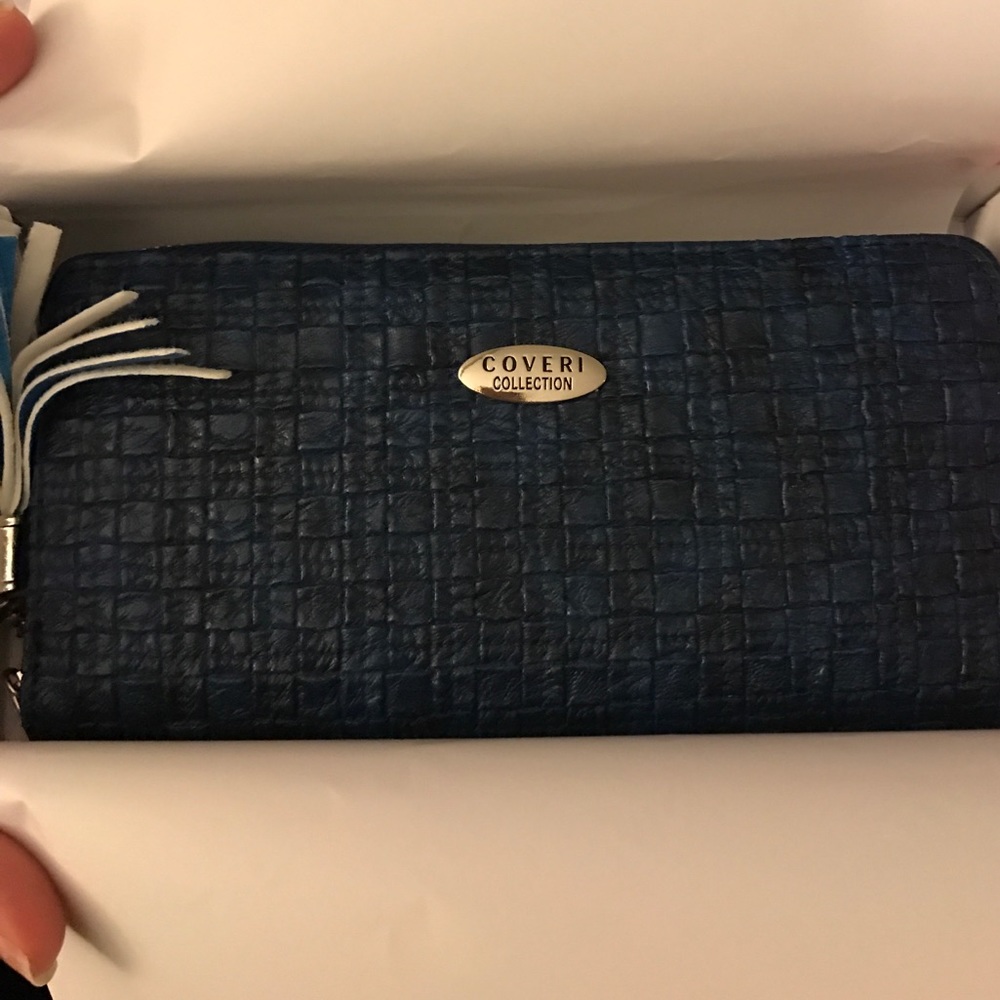 Blue Wallet with zipper closure and tassel