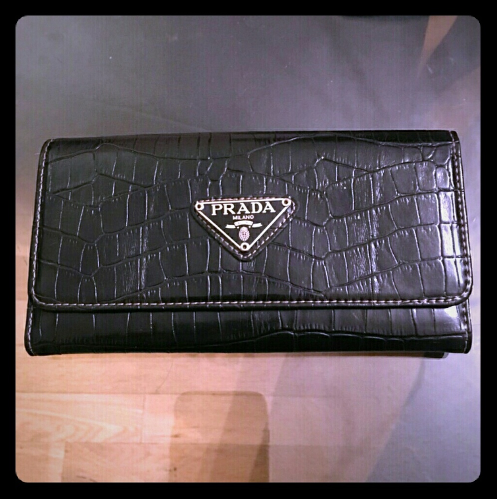 Classy Chic black leather Prada wallet!