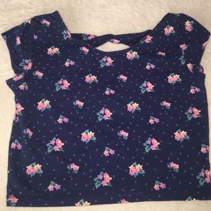 I am selling a blue floral cropped blouse
