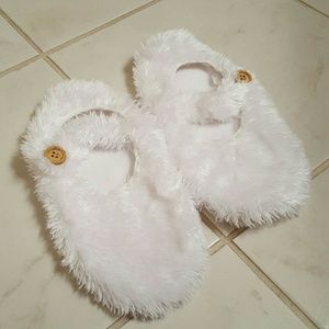 White fuzzy slippers
