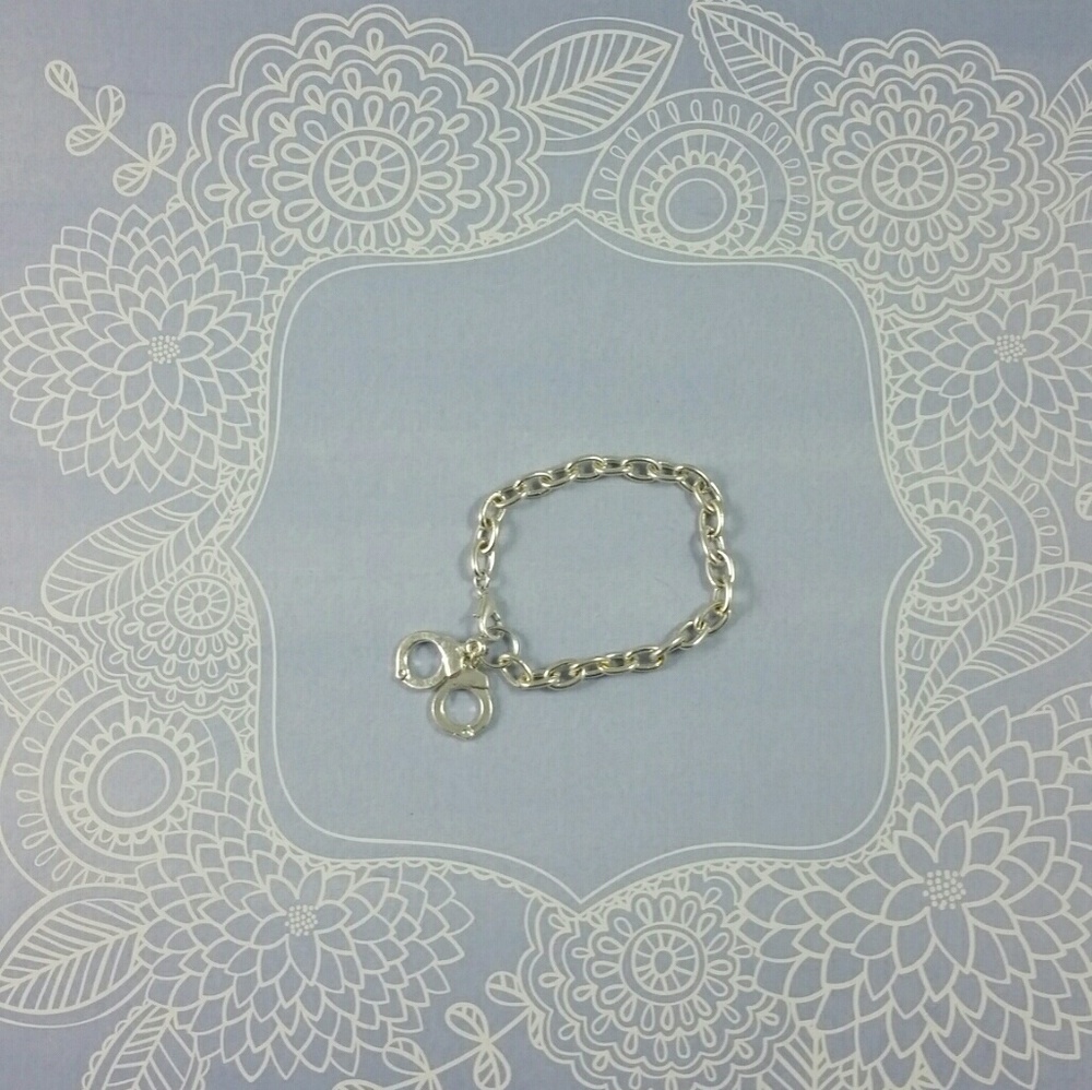 Silvertone handcuff bracelet