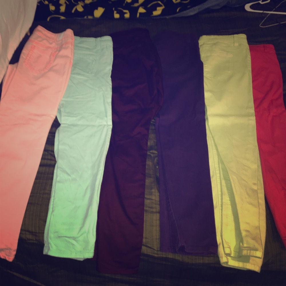Assortment of colored jeans