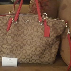 Red and brown leather Coach bag