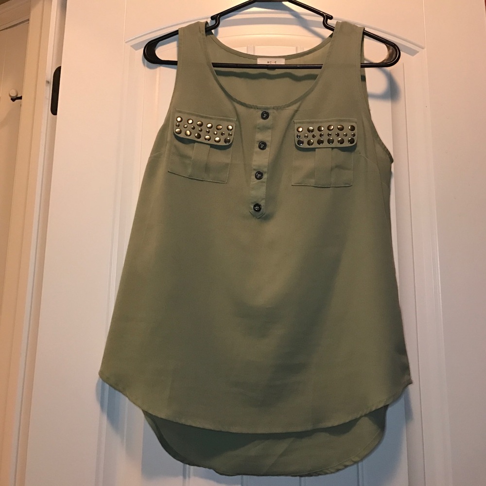 Sage colored top higher in the back