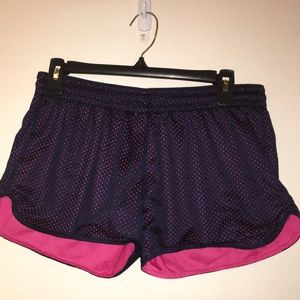 Nike navy and pink mesh sport shorts
