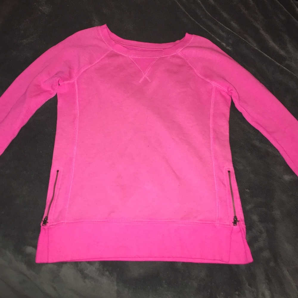 bright pink sweatshirt