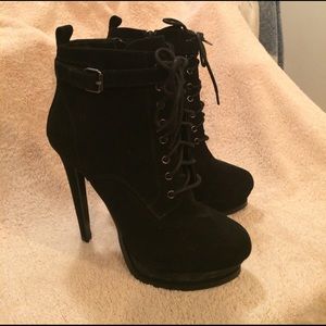 Black suede high heeled booties