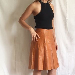 Prada pleated leather knee tennis style skirt