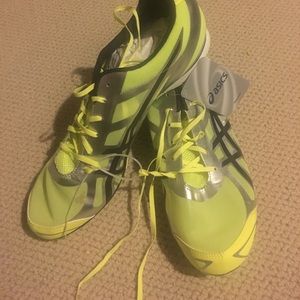 Brand new  ASICS track sneaker!!