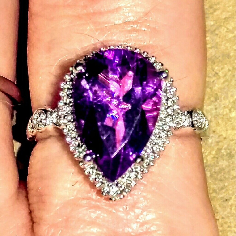 Amethyst surrounded by genuine Diamonds on SS