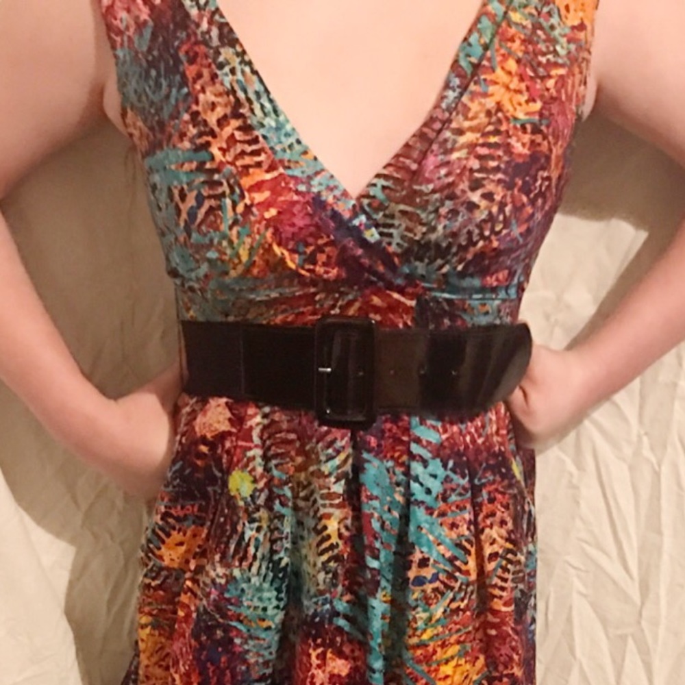 Teal, purple, red, orange multicolor dress.