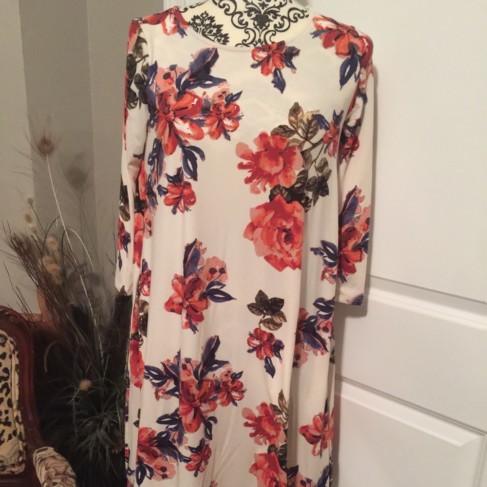 Reborn J Ivory floral midi dresses