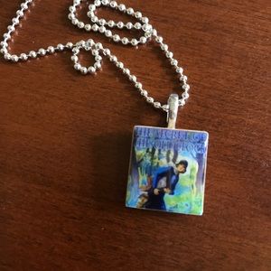 Necklace w scrabble tile features Nancy Drew