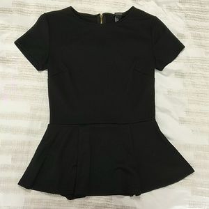 Peplum black shirt with Gold Zipper.