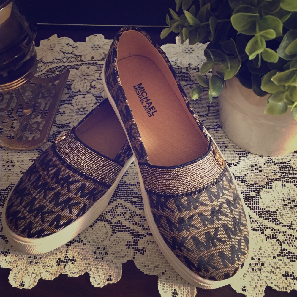 Michael Kors little girl's slip on's.