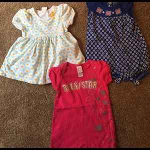 Bundle of baby rompers