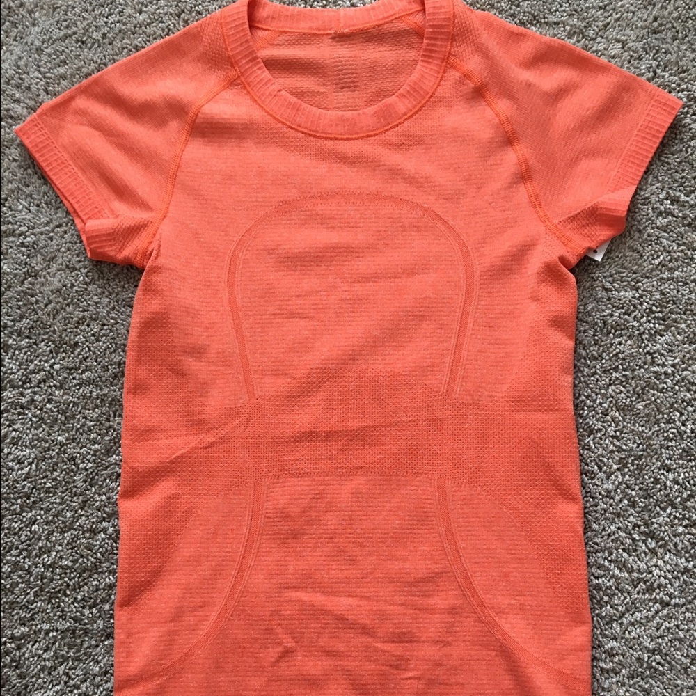 Lululemon Dazzle Orange Swiftly size 4