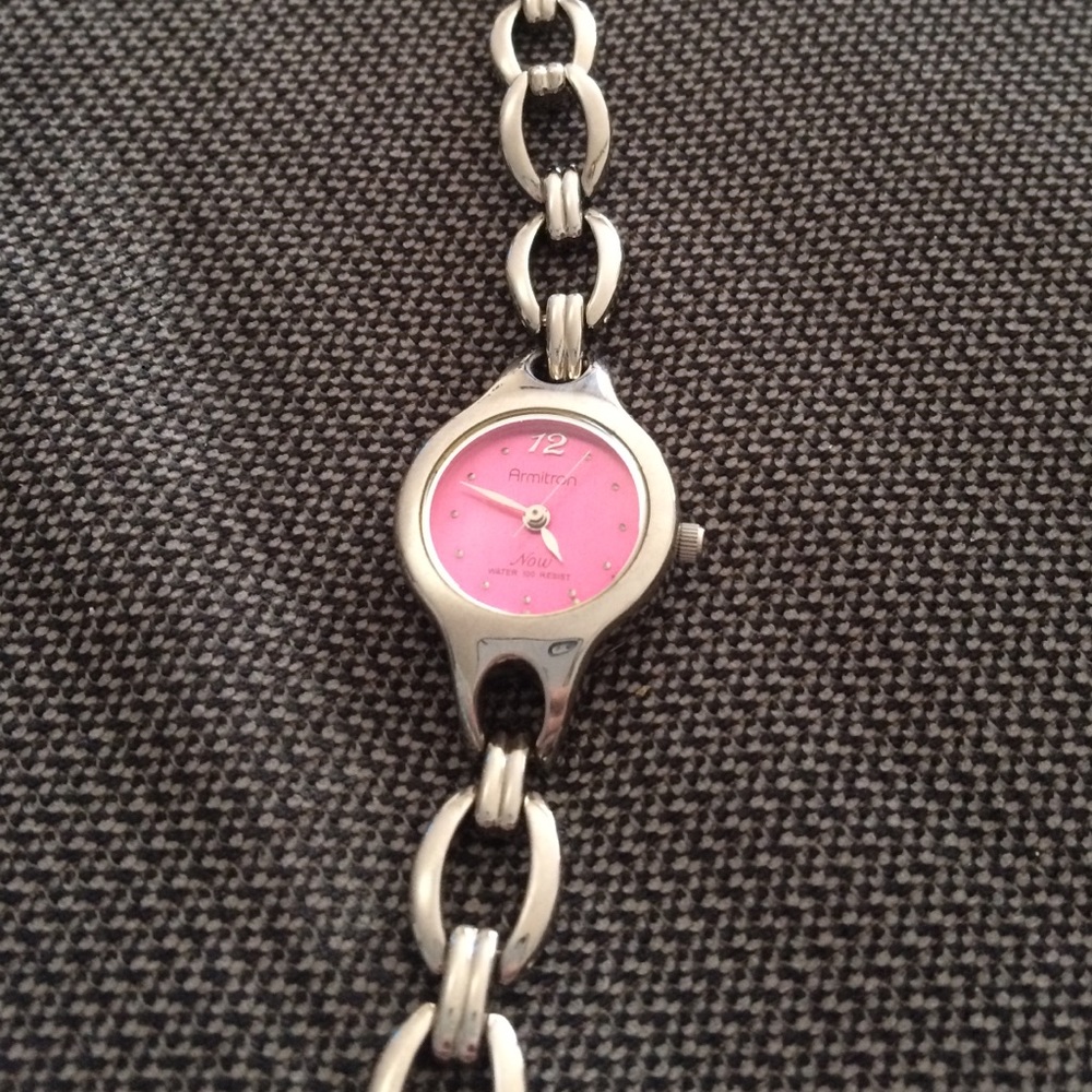 Pink face silver-toned watch