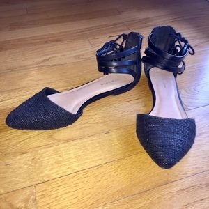 Black textured ankle strap flats