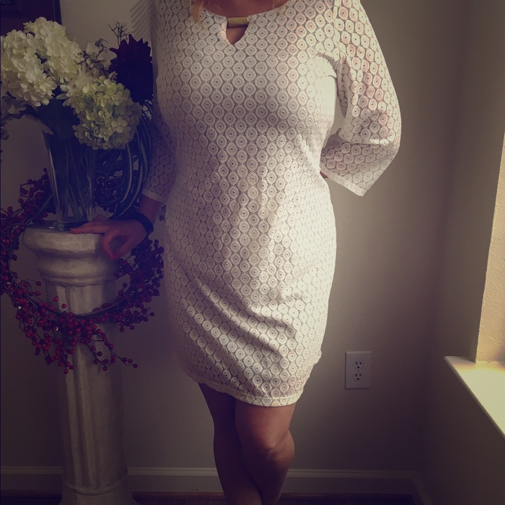 Cream lace and tan dress with a gold jewel
