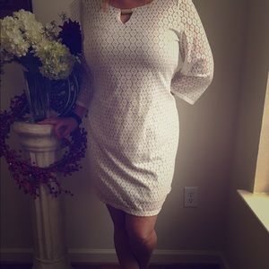 Cream lace and tan dress with a gold jewel