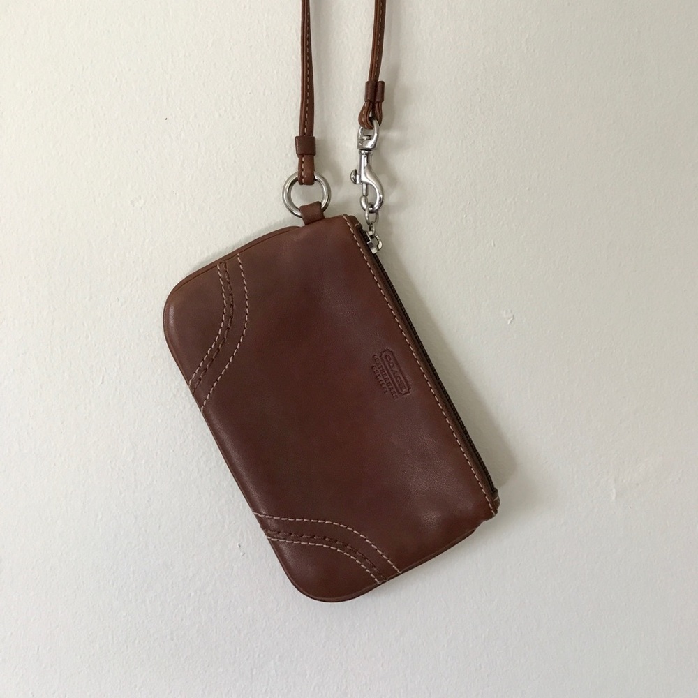 Brown leather coach wristlet