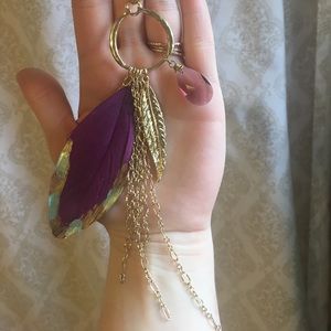 Long gold feather necklace