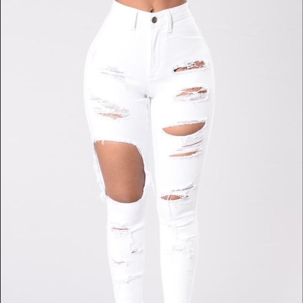 Distressed white jeans from fashion nova