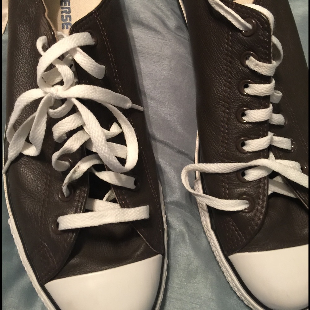 Brown leather converse