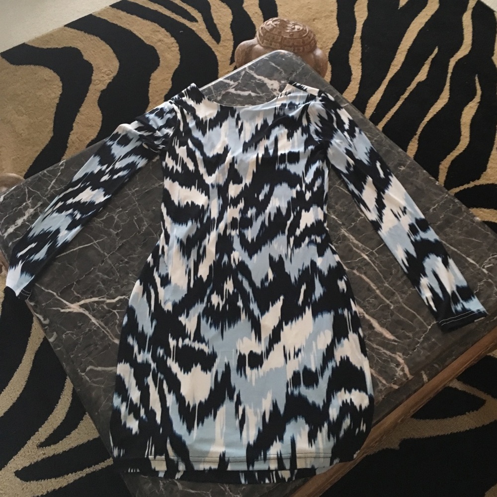 Sexy form fitting dress by J Lo